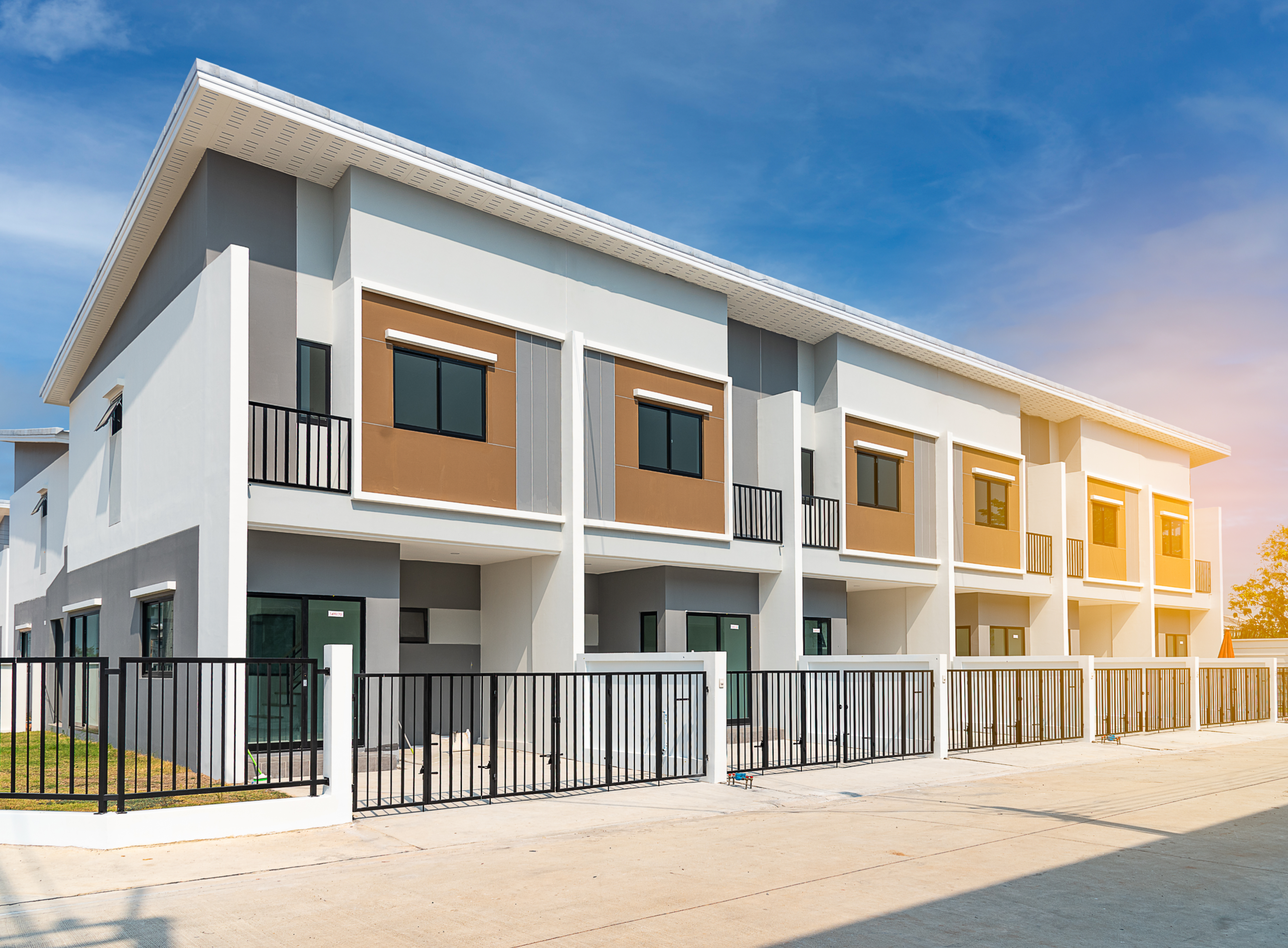 A row of modern two-story townhouses.